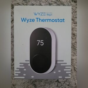Wyze Smart Thermostat in Black and White